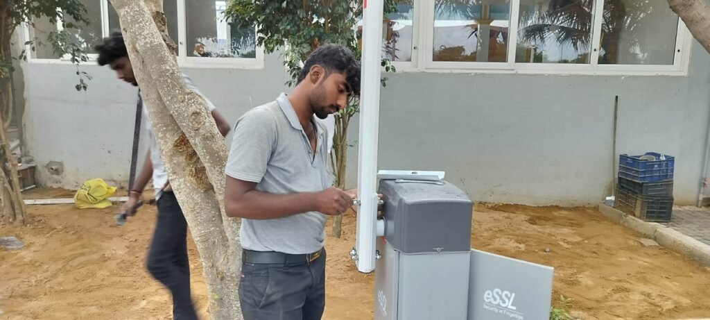 Smart Bio Nexus technician fitting an eSSL boom barrier at Royal Hatcheries in Koovathur